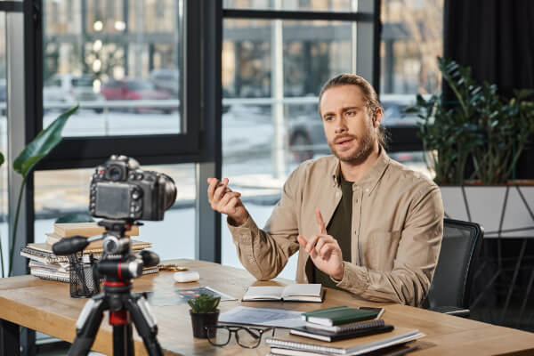 A man influencer is recording a marketing video